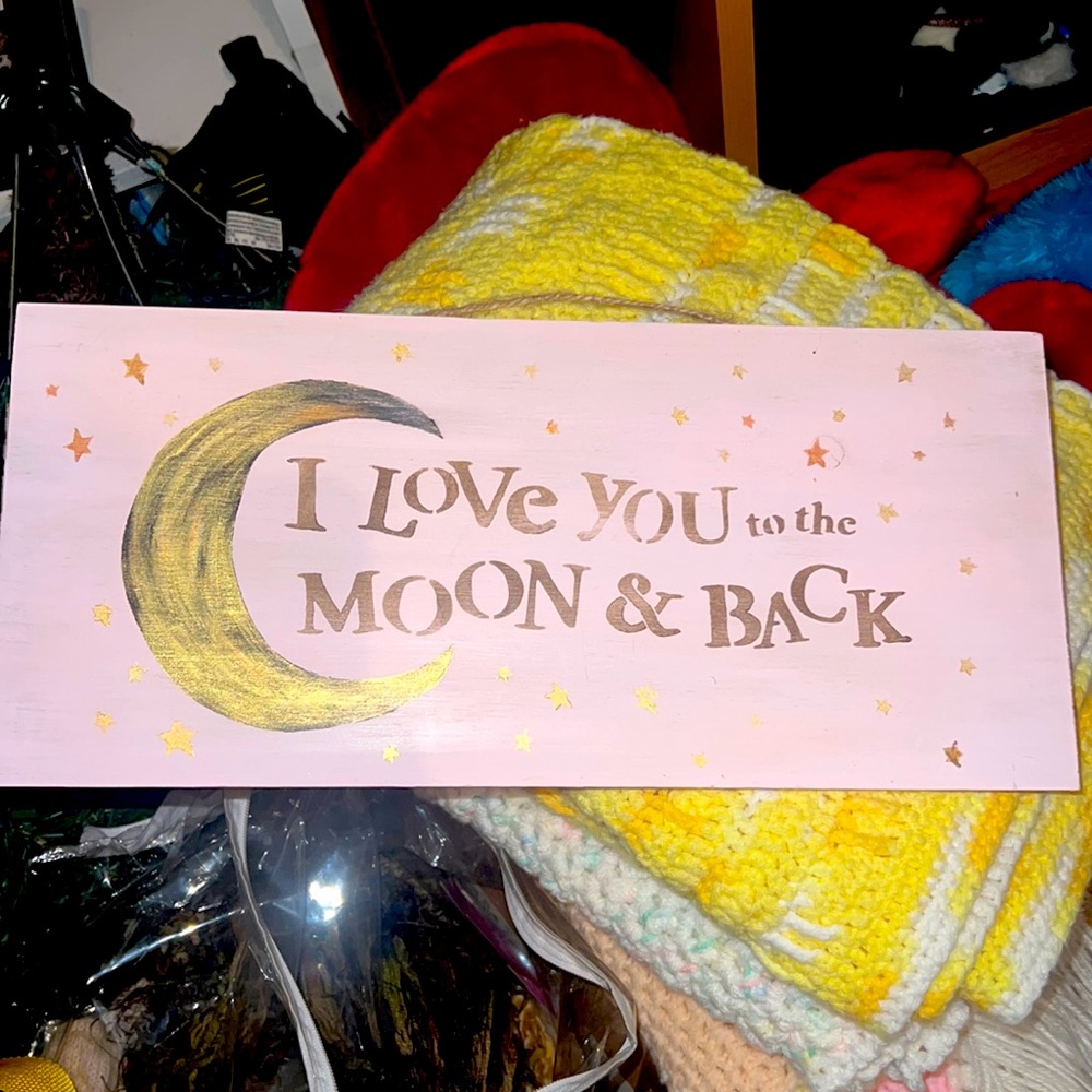 I love you to the moon & back baby pink sign with gold moon and stars. 7” by 16”